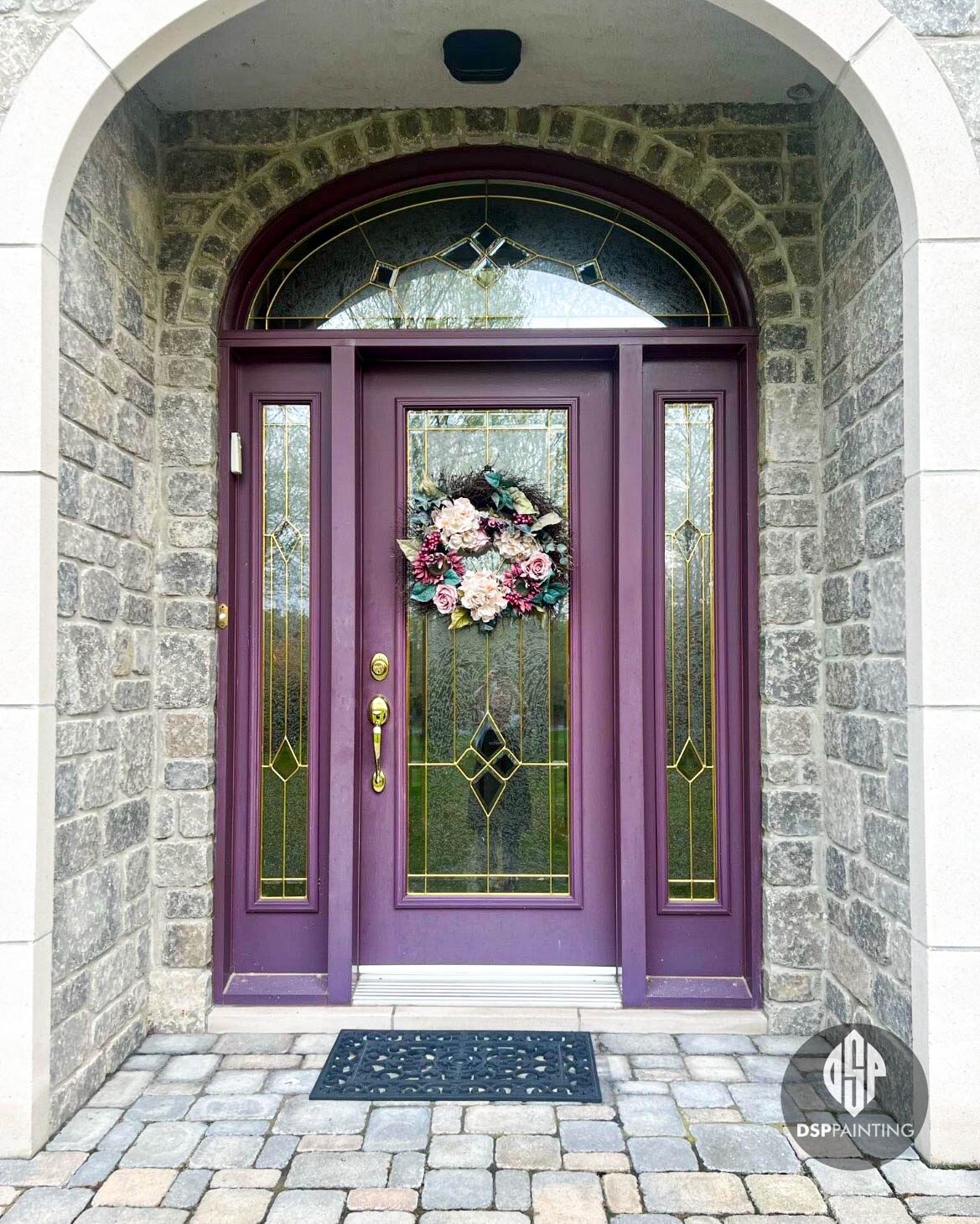 The entrance before painting, door, sidelights and surround all in aubergine purple